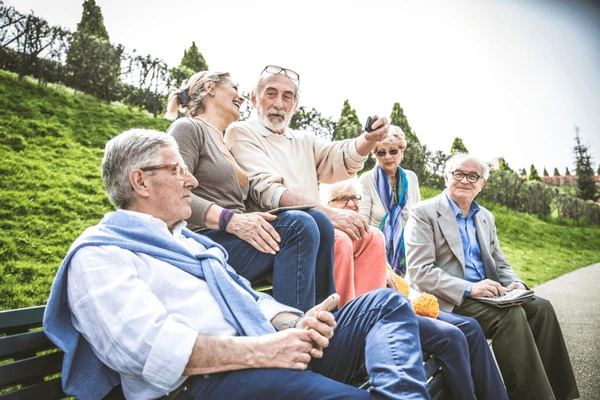 Group of elderly patients walking together